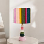 Charger l'image dans la visionneuse de galerie, Colorful striped table lamp on a round side table