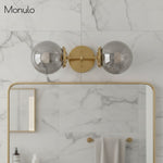 Cargar imagen en el visor de la Galería, Lámpara de tocador de baño moderna de estilo industrial Lumio Globe de cristal transparente
