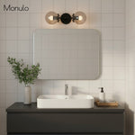 Cargar imagen en el visor de la Galería, Lámpara de tocador de baño moderna de estilo industrial Lumio Globe de cristal transparente
