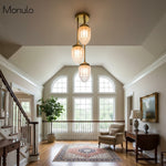 Load image into Gallery viewer, Tierlux Glass Tiered Skyscraper Shade Pendant – Art Deco Ceiling Light for Kitchen Island
