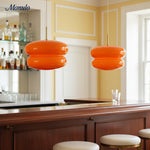 Cargar imagen en el visor de la Galería, Lámpara colgante Coloria Soft-Glow de cristal opalino: una lámpara colgante contemporánea para la sala de estar.