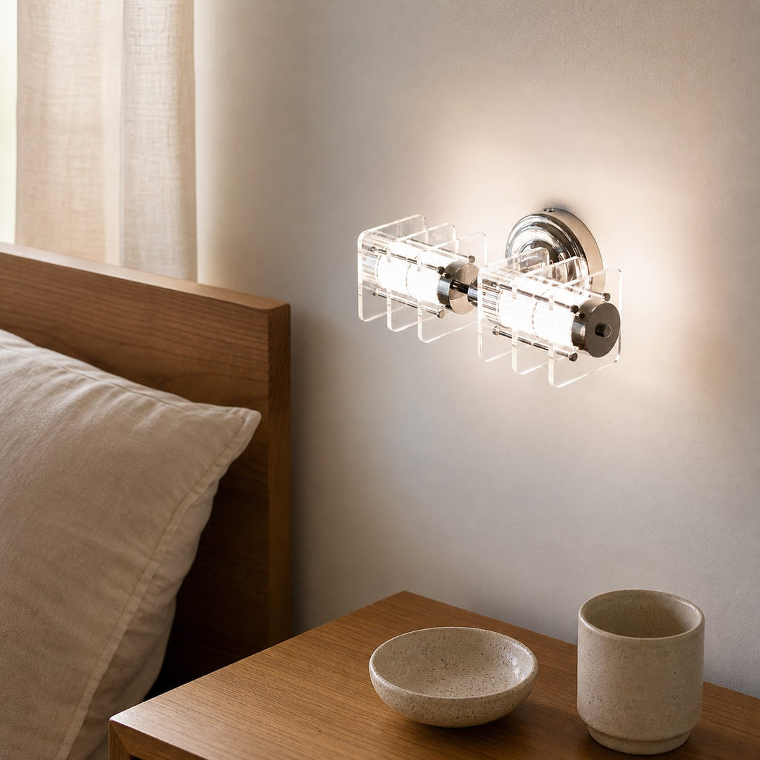 Horizontal Bauhaus acrylic chrome wall lamp in a bedroom wall setting