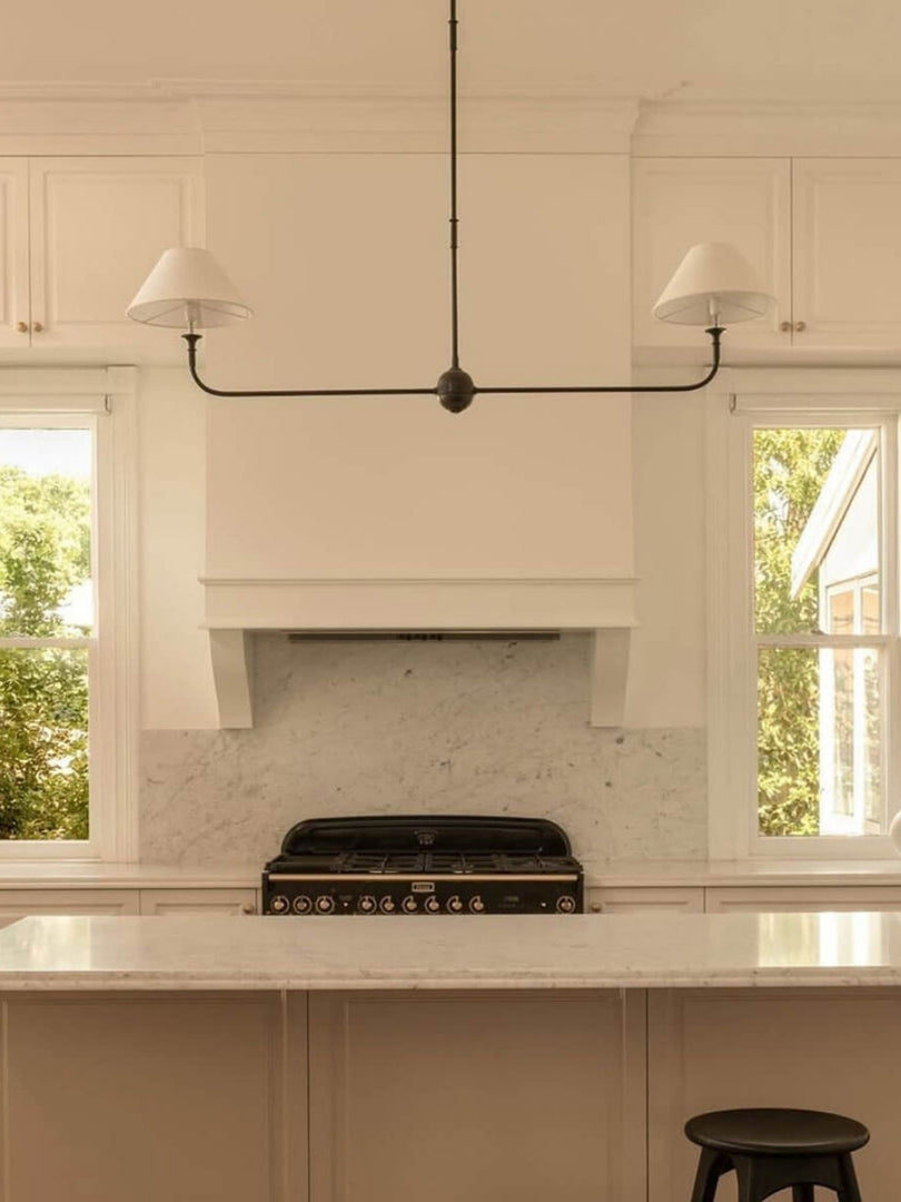 Sleek Chandelier Featuring Layered Linear Silhouette