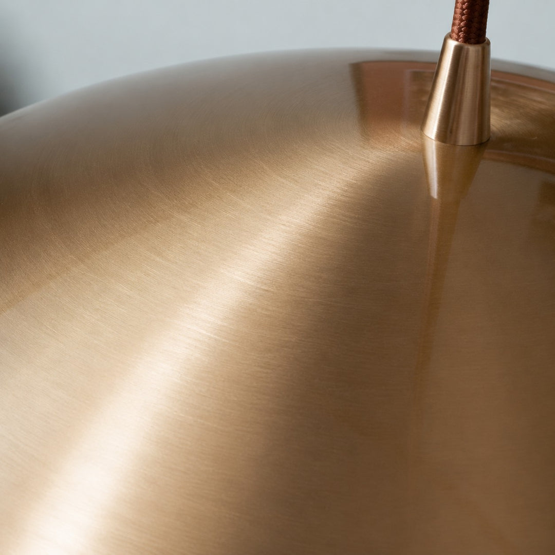 Close-up of the copper dome shade and suspension fitting