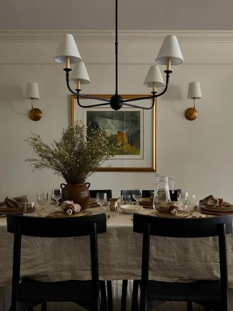 Sleek Chandelier Featuring Layered Linear Silhouette