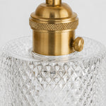 Bild in Gallery-Viewer laden, Close view of brass support arm and glass shade connection