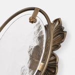 Load image into Gallery viewer, Close view of oval textured glass and antique brass frame detail