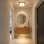 Bild in Gallery-Viewer laden, Chrome and milky white flush mount ceiling fixture installed in a compact entry area
