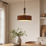 Cargar imagen en el visor de la Galería, Vintage brown leather pendant installed over a quiet dining nook