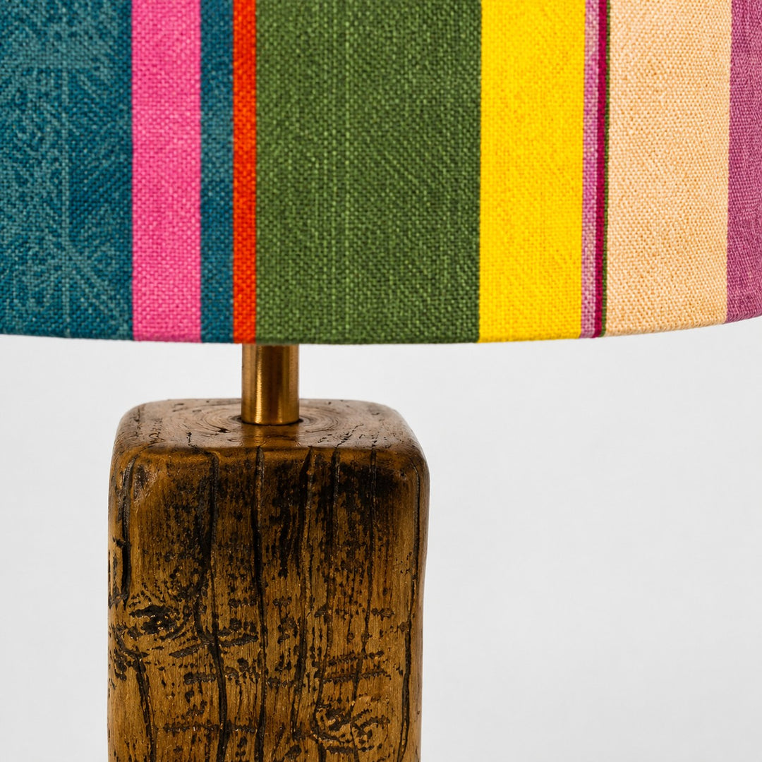 Colorful printed fabric table lamp in a styled interior