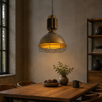 Cargar imagen en el visor de la Galería, Antique brass pendant light over a warm industrial table