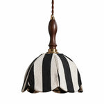 Charger l'image dans la visionneuse de galerie, Black and ivory striped fabric pendant lamp with dark wood handle and brass connector