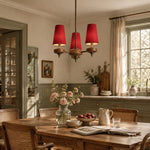 Charger l'image dans la visionneuse de galerie, 3-light Hour Rho chandelier in red velvet styled in a warm interior