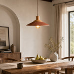 Load image into Gallery viewer, Brown leather pendant above a bright dining table