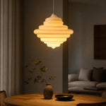 Load image into Gallery viewer, White glass pendant light over table in warm room