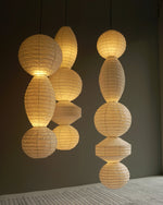 Bild in Gallery-Viewer laden, Stacked Ribbed Paper Swag Pendant Light