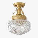 Load image into Gallery viewer, Clear pressed glass Art Deco ceiling light with brass finish