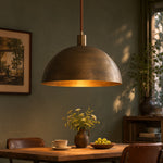 Load image into Gallery viewer, Aged matte brass dome pendant light in a calm room