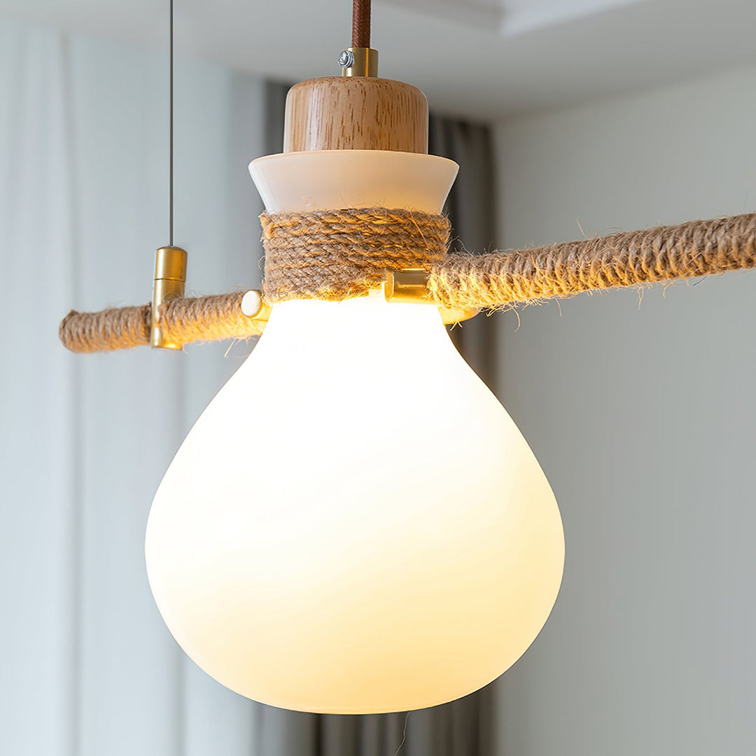 Lampe à suspension en verre et corde de chanvre