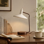 Bild in Gallery-Viewer laden, Japanese iron desk lamp beside books and a cup on a wooden study desk