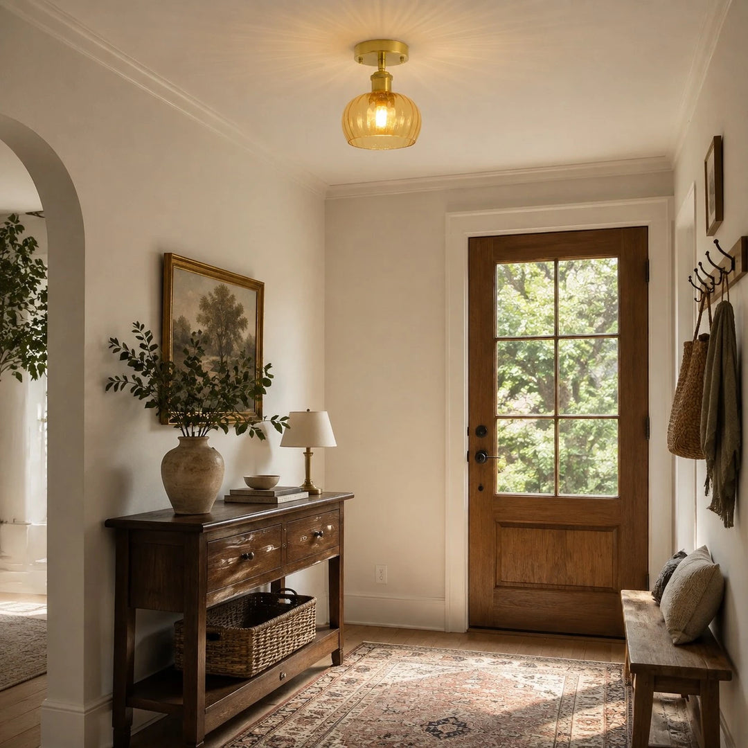 Cognac glass ceiling light in a warm foyer