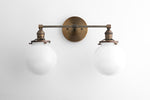 Load image into Gallery viewer, Lumio Globe Glass Globe Vanity Light - Modern Two Light Bathroom Sconce
