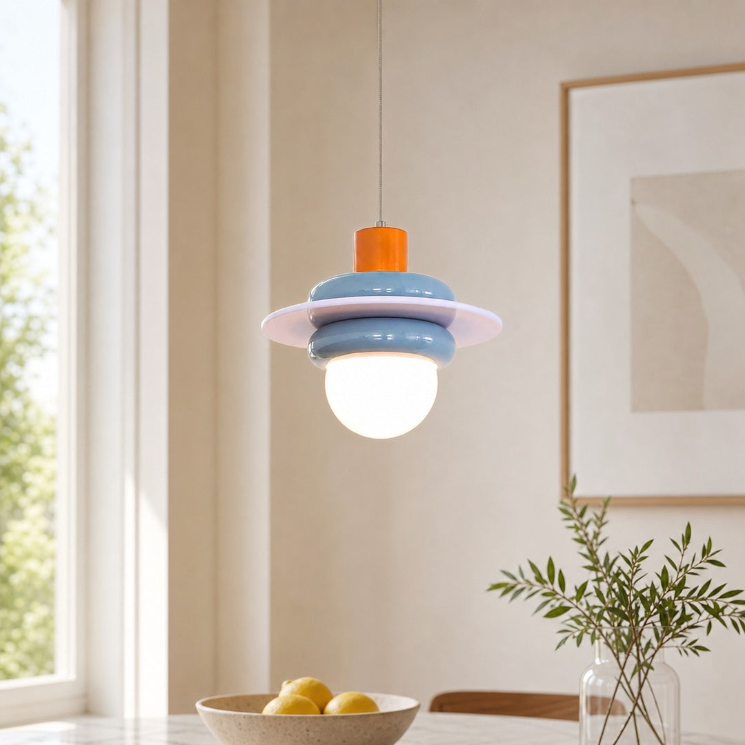 Sea salt blue pendant light installed near a bright window