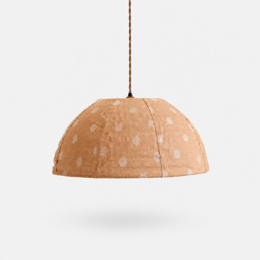Wabi-sabi polka dot linen pendant light on a light background
