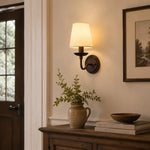 Cargar imagen en el visor de la Galería, Antique bronze wall sconce above an entryway console