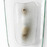 Bild in Gallery-Viewer laden, Front detail of clear glass wall sconce with textured inner shade