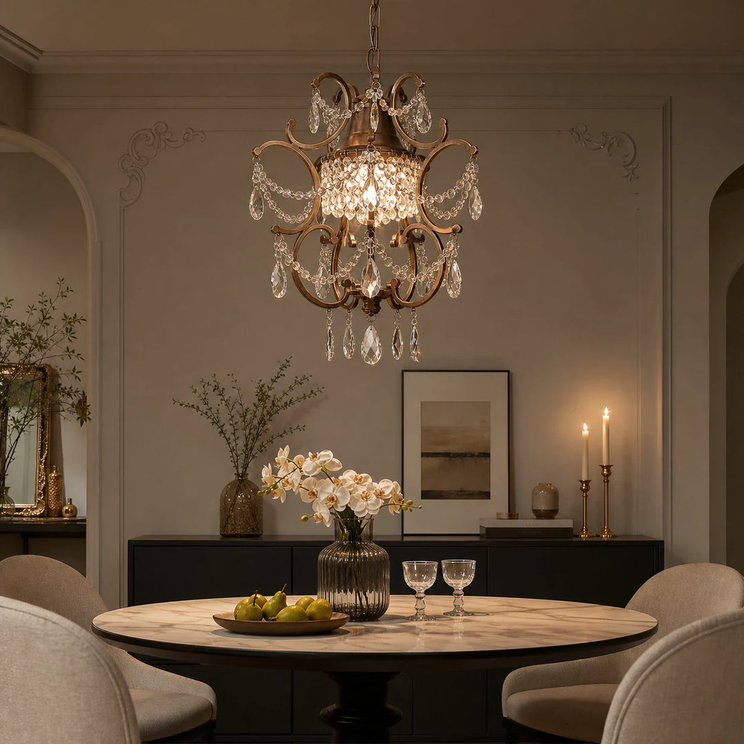 Clear crystal pendant light above a dining table