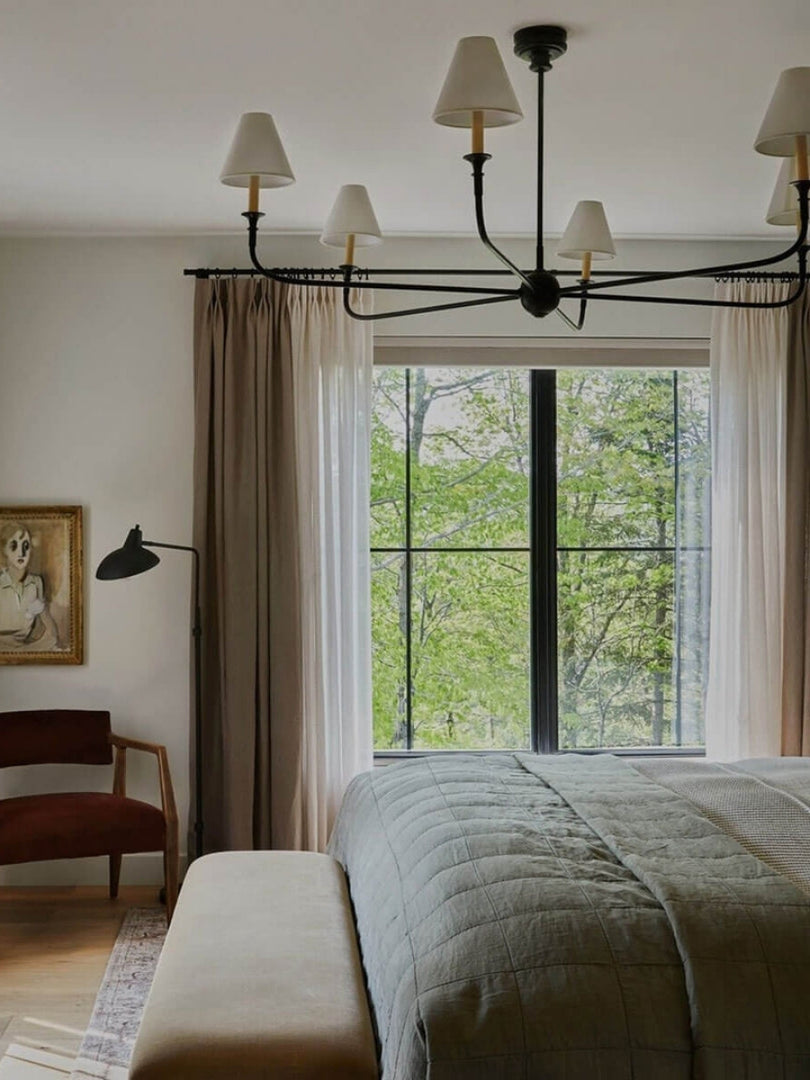 Sleek Chandelier Featuring Layered Linear Silhouette