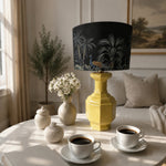 Load image into Gallery viewer, Faceted Lemon Yellow ceramic table lamp in a living room