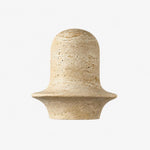 Charger l'image dans la visionneuse de galerie, Travertine wall sconce front view showing rounded stone shade and flared rim