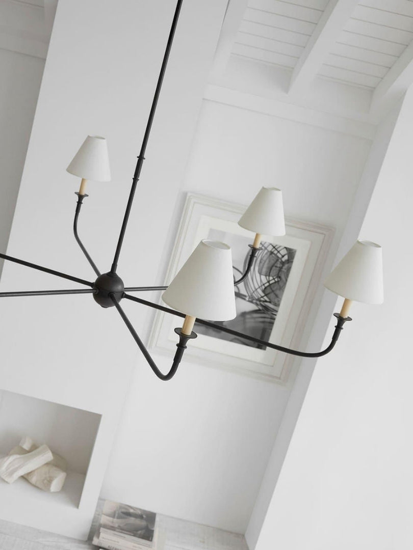 Sleek Chandelier Featuring Layered Linear Silhouette