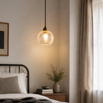 Load image into Gallery viewer, brass glass pendant light used as warm bedside lighting