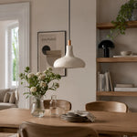 Load image into Gallery viewer, Off-white rice paper pendant lamp above a dining table