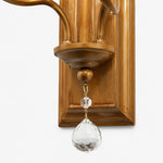 Load image into Gallery viewer, Close view of brass lower frame and hanging crystal drop