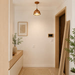 Load image into Gallery viewer, Natural woven pendant light installed in a warm entryway