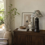 Load image into Gallery viewer, Dark ceramic table lamp styled on a wooden console