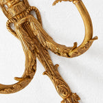 Bild in Gallery-Viewer laden, Close view of the curved carved brass arm detail