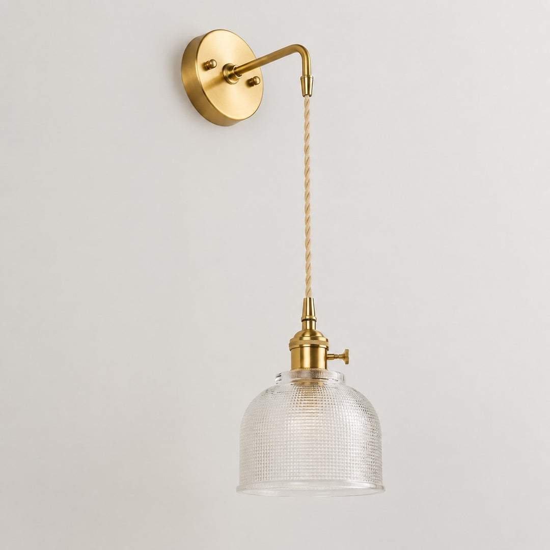 Clear glass wall light with brass arm, CW shade 11 cm high and 14 cm diameter