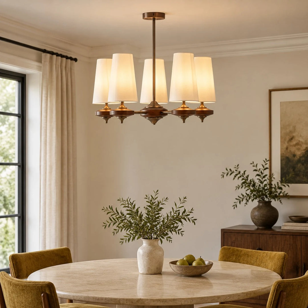 Five-light Hour Rho chandelier above a dining table