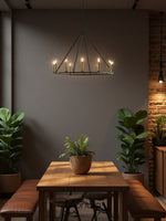 Cargar imagen en el visor de la Galería, Lámpara de araña con forma de rueda de carro de Rowan Candle - Iluminación rústica con ruedas redondas

