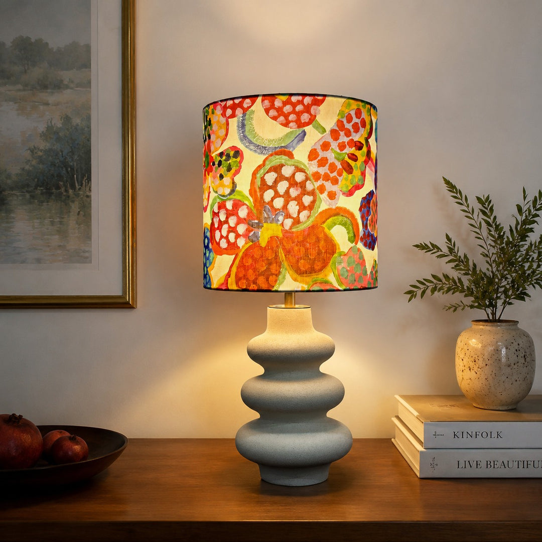 Sculptural ceramic table lamp in a warm room setting