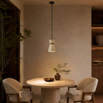 Bild in Gallery-Viewer laden, Single travertine pendant light above a round dining table