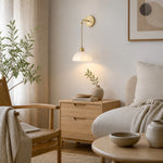 Load image into Gallery viewer, Dome shade wall sconce installed above a bedside table