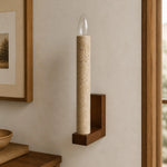 Cargar imagen en el visor de la Galería, Natural travertine wall sconce beside framed art