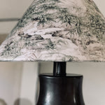 Load image into Gallery viewer, Close view of botanical shade print and dark ceramic body