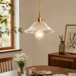 Cargar imagen en el visor de la Galería, Style I flared clear glass pendant above a dining table
